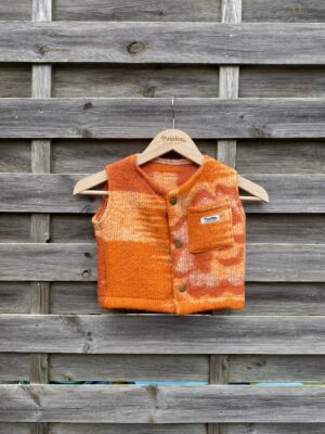 Le gilet enfant orange fleur