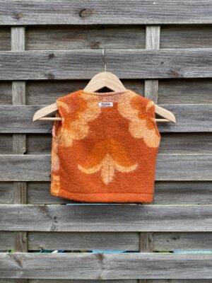 Le gilet enfant orange fleur