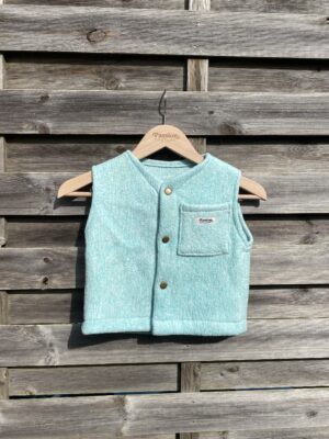 Le gilet bleu émeraude