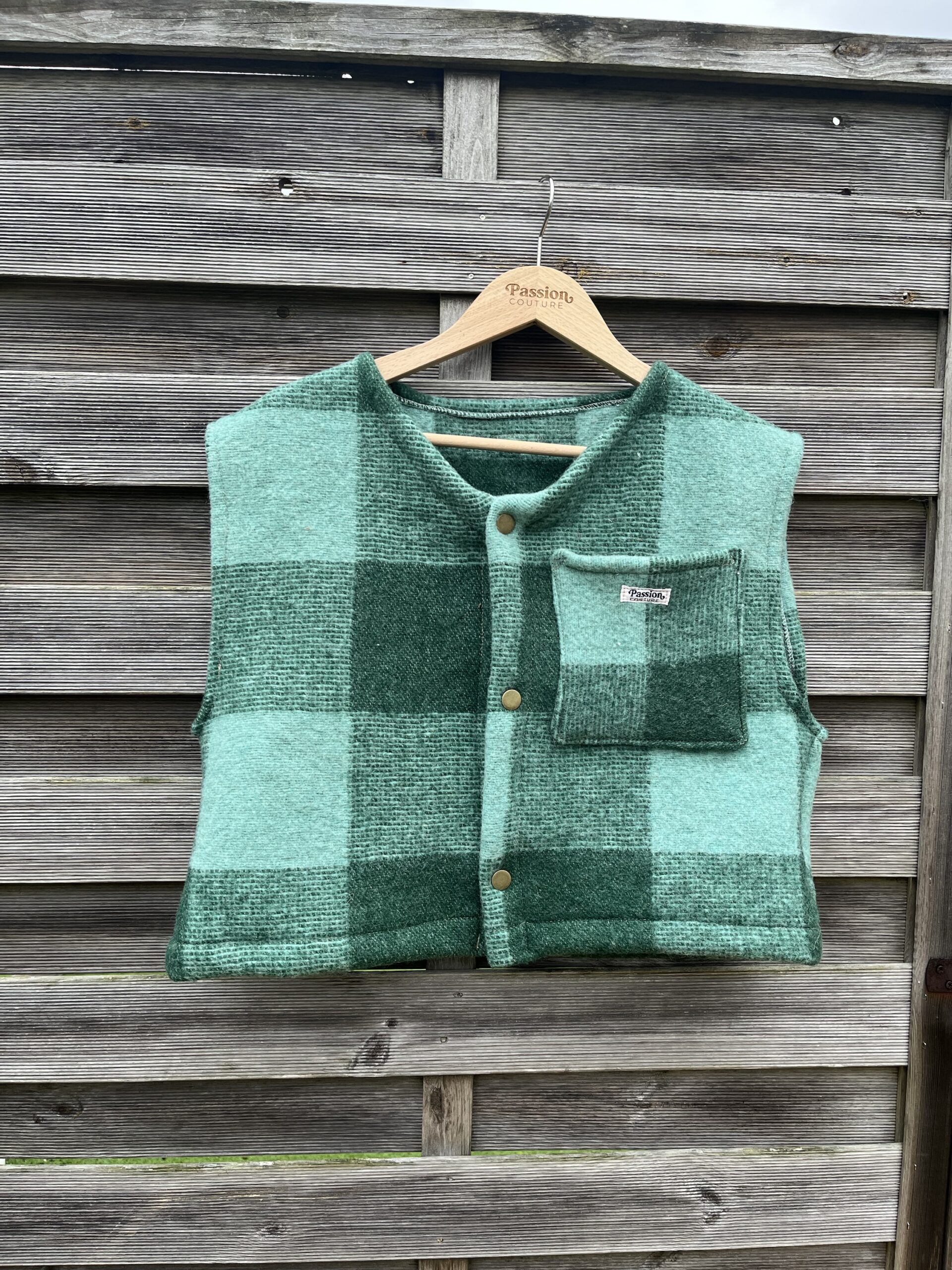 Le gilet carreaux vert