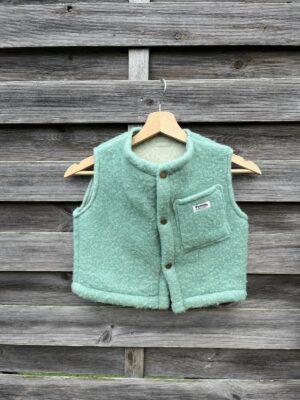 Le gilet enfant en laine bleu-vert