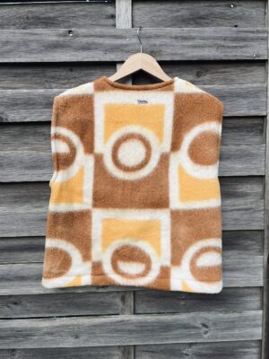 Le gilet orange 70’S