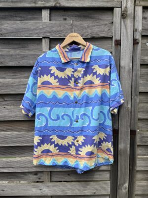 La chemisette bleue soleil