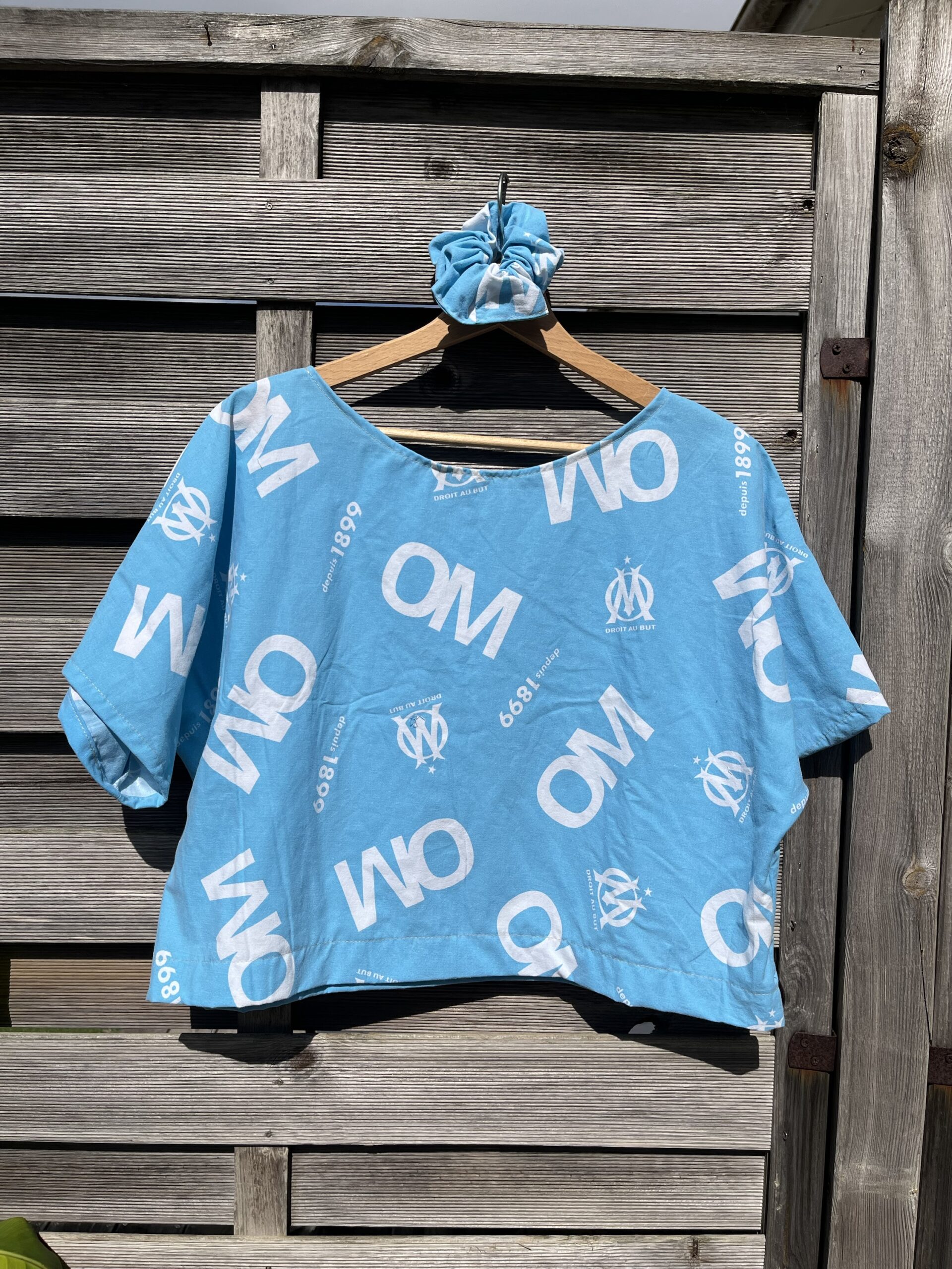 Le tee-shirt OM